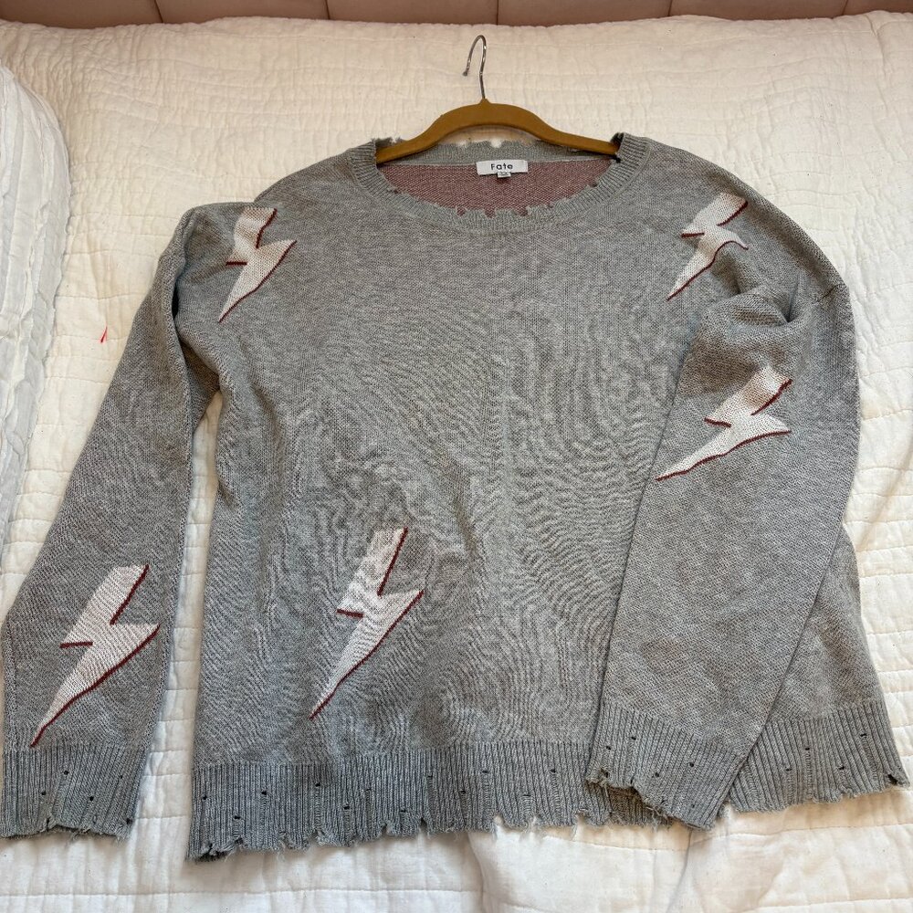 Fate frayed gray long sleeve sweater with Lightening Bolts